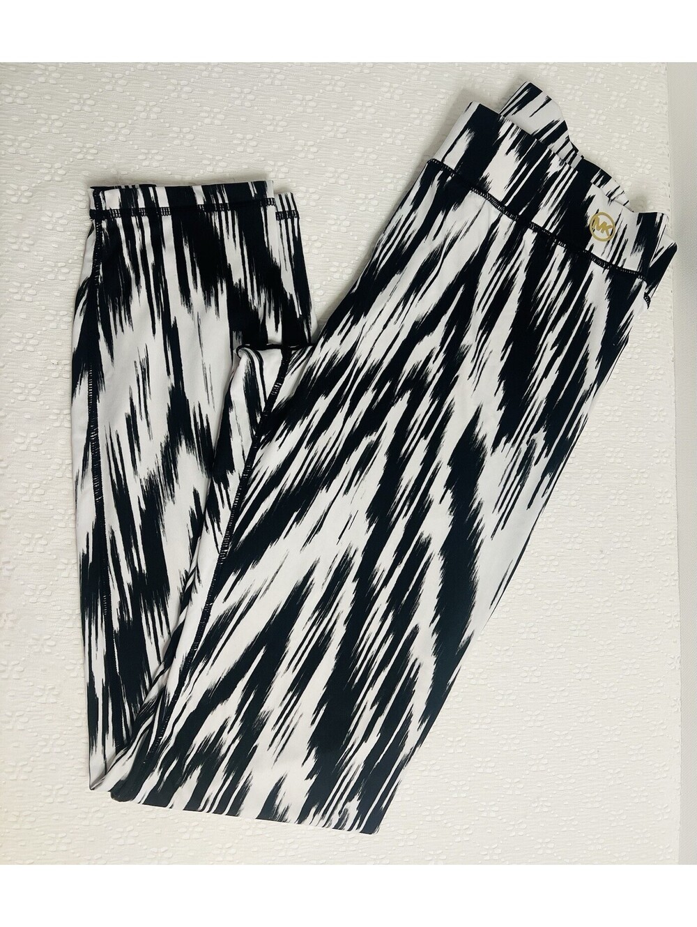 MICHAEL KORS Ikat Skinny Yoga leggings pull on pants black white M gold MK